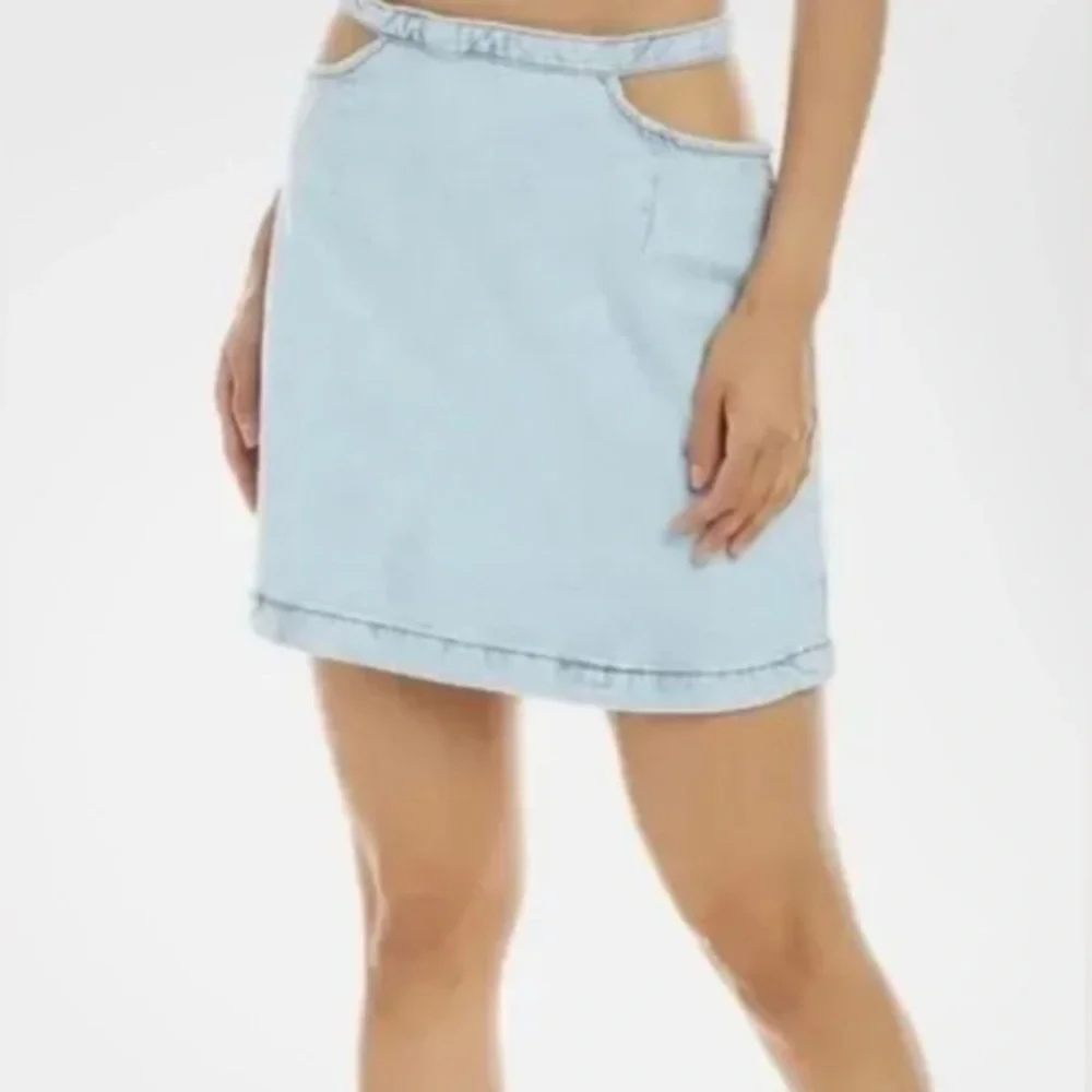 We wore what denim cut out mini skirt Light Denim Skirt Indigo Confort ($69) M